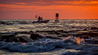 fisherman at sunset, indian river inlet, de